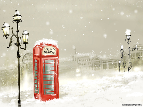 red phone booth in snow